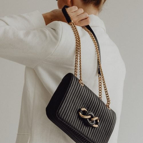 kaboompics_anonymous-female-in-trendy-outfit-with-bag-27786